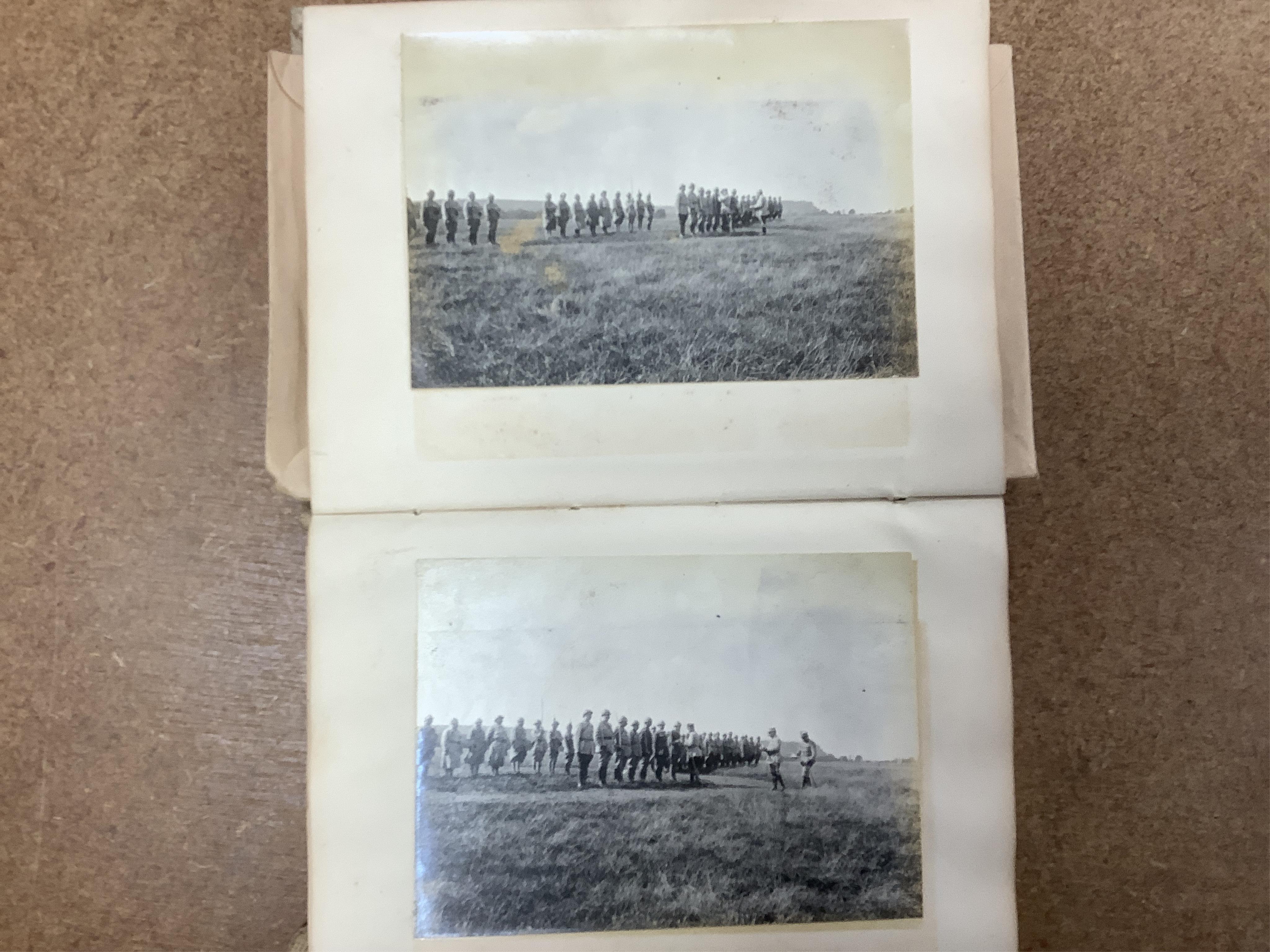 A WWI Ambulance and Balloon Brigade photograph album, pocket watch, coin, etc. Condition - fair, pocket watch ticks when wound